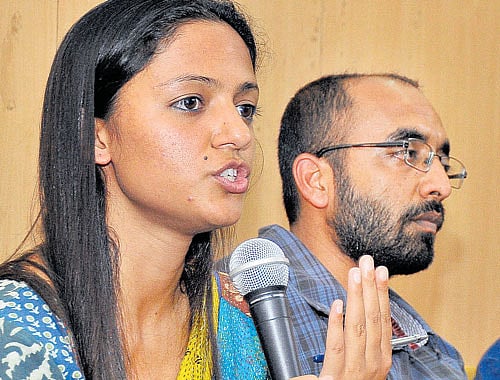 Raising questions: Shehla Rashid Shora, vice-president, JNU Students Union, speaks at an event in the City on  Friday. Former JNUSU president Akbar Chawdhary is also seen. DH photo