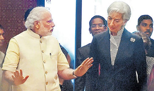 Prime Minister Narendra Modi with IMF MD Christine Lagarde during the conference in New Delhi on Saturday.