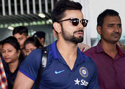 Cricketer Virat Kohli arrives at NSCBI Airport for the upcoming T 20 World Cup, in Kolkata on Monday. PTI Photo