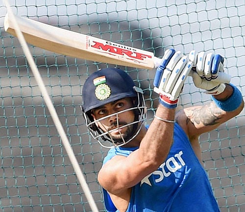 All eyes on him: India's Virat Kohli during a nets session on the  eve of their World T20 opener against New Zealand in Nagpur on Monday. PTI