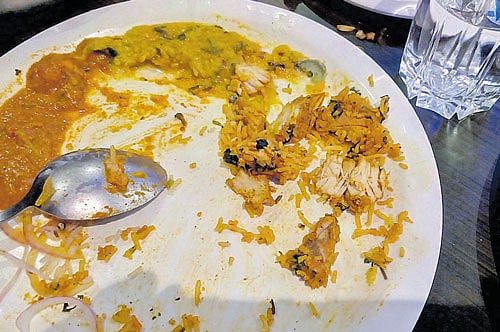 The plate of Chicken Biriyani which was served to the family of Hemant Khinwasara at Rangoli veg restaurant on Kalidasa Road at Gandhi Nagar in the City on Sunday night. dh photo