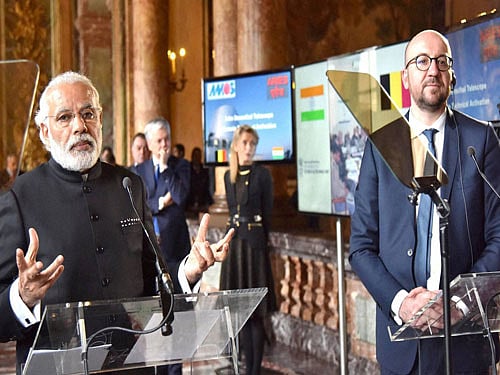 The Prime Minister, Shri Narendra Modi giving his Press Statement, during the Remote Technical Activation of India-Belgium Aryabhatta Research Institute of Observational Sciences (ARIES) Telescope, in Brussels, Belgium on March 30, 2016.  PTI Photo