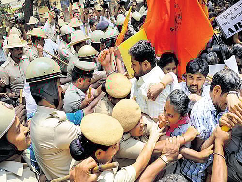 Police arrest ABVP members who were protesting against II PU chemistry exam paper leak in front of the PU Board office in Bengaluru on Friday.