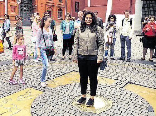 Good times: The author standing at the Russian version of a wishing well at the Red Square.