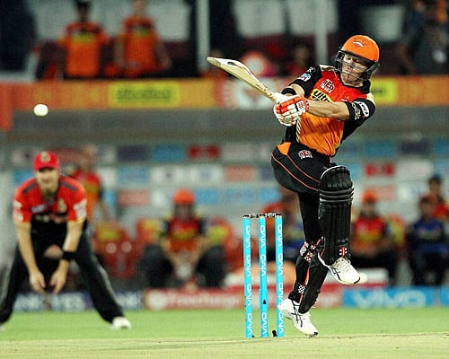 Sunrisers Hyderabad captain David Warner plays a shot during the IPL 2016 between the Sunrisers Hyderabad and the Royal Challengers Bangalore at the Rajiv Gandhi Intl. Cricket Stadium, Hyderabad on Saturday. PTI Photo