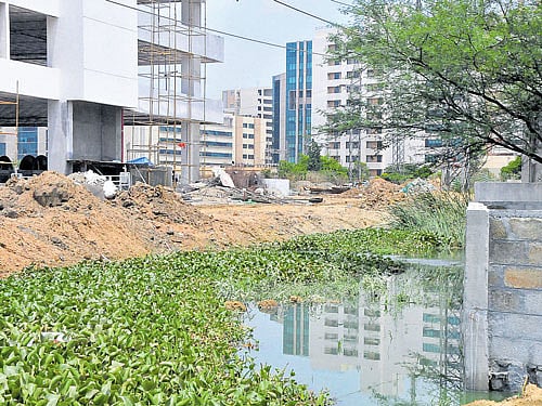 The feeder canal in Defence Enclave near Hebbal has heavy encroachments which cause flash floods. DH photo
