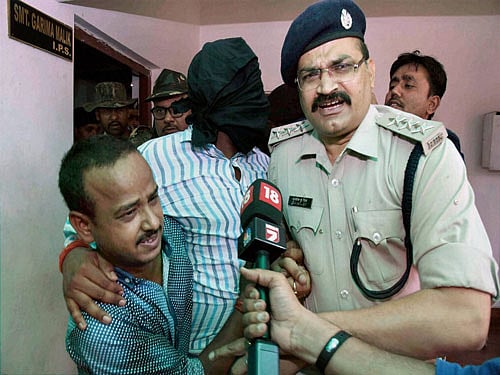JDU MLC Manorama Devi's son Rocky Yadav, accused in the murder of a teenager, in police custody in Gaya on Tuesday. PTI Photo