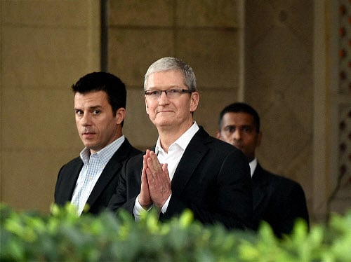 Apple's CEO Tim Cook greets in 'namaste' style at the Taj Mahal Palace hotel in Mumbai on Wednesday. PTI Photo