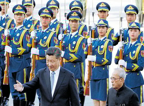 GRAND WELCOME: Chinese President Xi Jinping and President Pranab Mukherjee attend a welcoming ceremony at the Great Hall of the People in Beijing, on Thursday. REUTERS