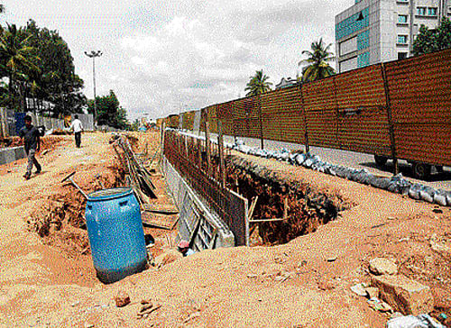 The underpass work on Magadi Road has greatly reduced the space available for vehicles, slowing down traffic. dh photo
