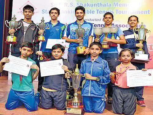 champions Winners of the State-ranking table tennis tournament. Standing (From left):&#8200;Rakshith RB (youth boys), Kaustubh Kulkarni (junior boys), Nitin V (men) Spoorthy MV  (junior girls, youth girls and women), Anarghya M (sub-junior girls). Kneeling: Sujan Bharadwaj  (cadet boys), Hrishikesh AR Shetlur (mini cadet boys), Marcose Gigu (sub-junior boys), Sahana H Murthy (mini cadet girls). DH photo