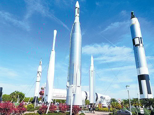 cosmos on earth (Clockwise from above) The Rocket Garden; a sample moon rock; a painting of the International Space Station at Kennedy Space Centre, NASA, in Florida. Photos by author