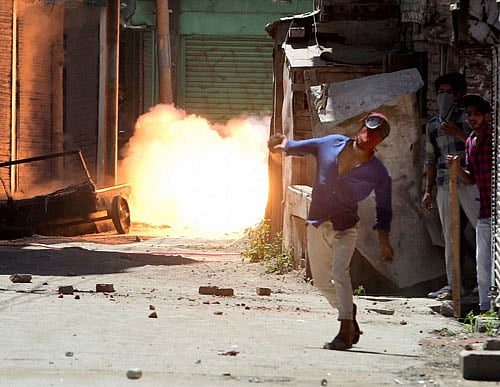 Protesters attacked the army camp at Ajas in Bandipora district, forcing the security forces to open fire. Three persons were injured in the incident, police said. pti file photo