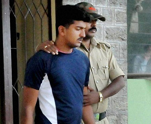 DYSP Kallappa handibhag's suicide case accused Abhiram is produced in the district court by CID officers in Chikmagalur, Karnataka on Thursday. PTI Photo
