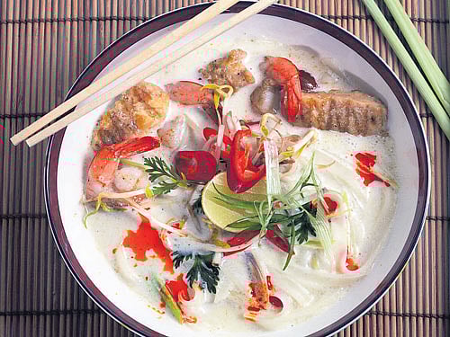 tasty Seafood ramen in coconut broth.