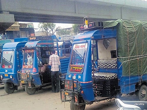 Goods tempos waiting for customers in Ahmedabad.