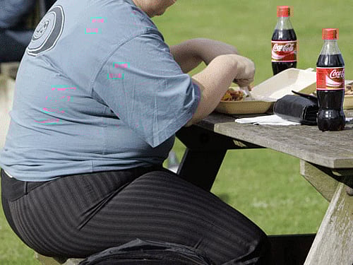 The National Family Health Survey, conducted by the Union government, has found at least 32% women and 26% men in Bengaluru obese or overweight. AP/PTI File Photo