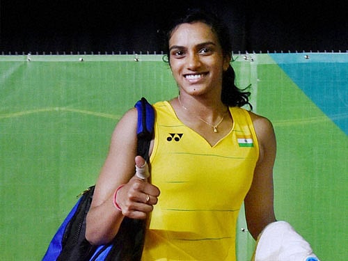 Indian shuttler Pusarla V Sindhu celebrates her win in women's singles quarter-finals match against world No.2 Wang Yihan of China in 2016 Summer Olympics at Rio de Janeiro in Brazil on Tuesday. Sindhu win the match 22-20, 20,19. PTI Photo