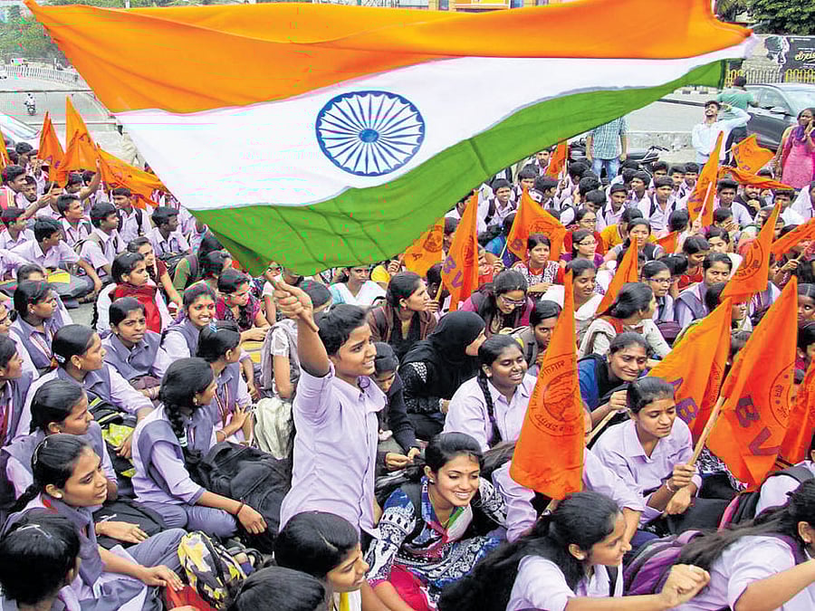 The protesters took out a procession from Magadi Road and converged in front of a shopping mall near SJR college.