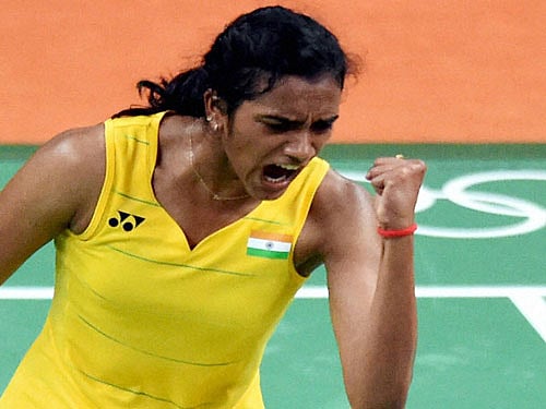 India's Sindhu Pusarla celebrate after defeating Japan's Nozomi Okuhara during a women's singles semifinal match at the 2016 Summer Olympics in Rio de Janeiro, Brazil, Thursday. PTI Photo