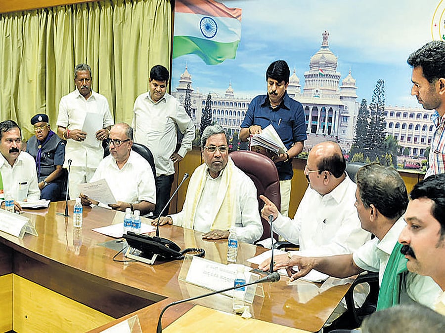 Kisan Khet Mazdoor Congress President Sachin Meega submits a memorandum to Chief Minister Siddaramaiah in Bengaluru.