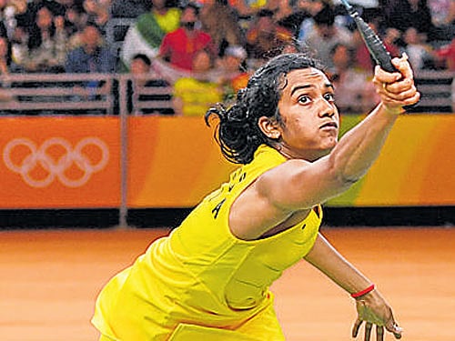 PV Sindhu plays a shot during the final. dh photo