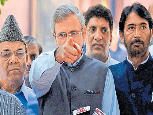 National Conference chief Omar Abdullah with Opposition leaders from Jammu and Kashmir addresses the media after meeting Prime Minister Narendra Modi in New Delhi on Monday. PTI