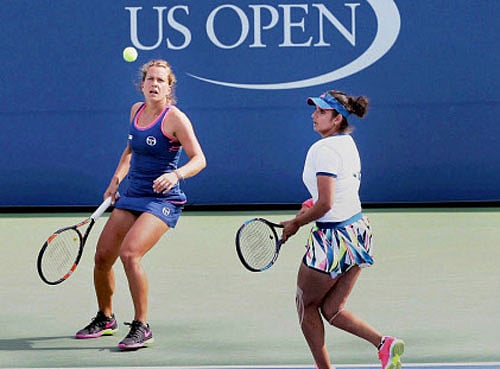Sania Mirza and her partner Barbora Strycova in action. PTI Photo
