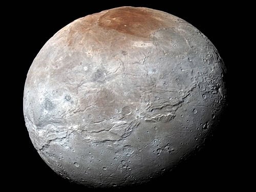The models also suggested that in Charon's springtime the returning sunlight triggers conversion of the frozen methane back into gas. Image courtesy :NASA