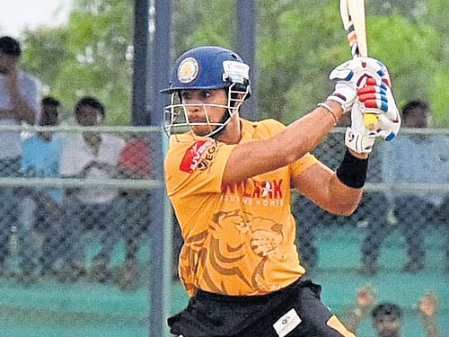 Blistering knock: Hubli Tigers' Kunal Kapoor hits one to the fence en route to 65 against Mangalore United. DH PHOTO