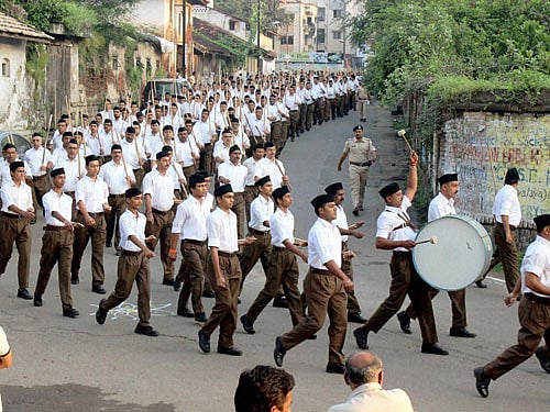 RSS swayamsevak taking out Path Sanchalan(route march) in the new uniform on the occasion of Vijaya Dashami celebration in Nagpur of Maharashtra on Tuesday. PTI Photo