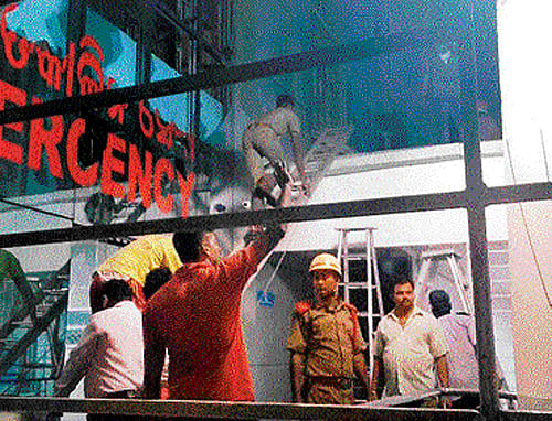 Rescue work underway at the Sum Hospital in  Bhubaneswar on Monday night. PTI