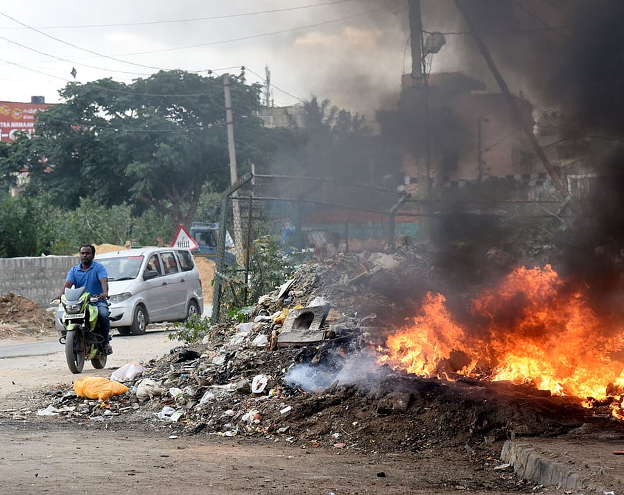 Roadside trash burning is largely un-examined as a factor that influences air quality, radiative forcing, and human health even though it is ubiquitously practised throughout India. DH file Photo