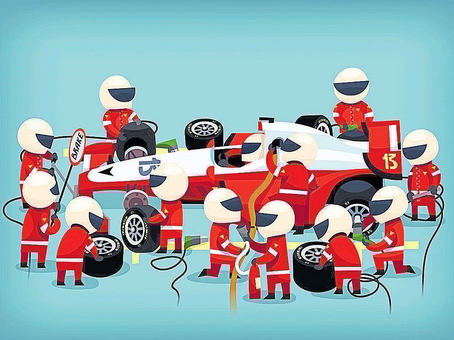 quality check The technical staff build the car for racing and ensure that they are able to complete tasks quickly and efficiently. representative image