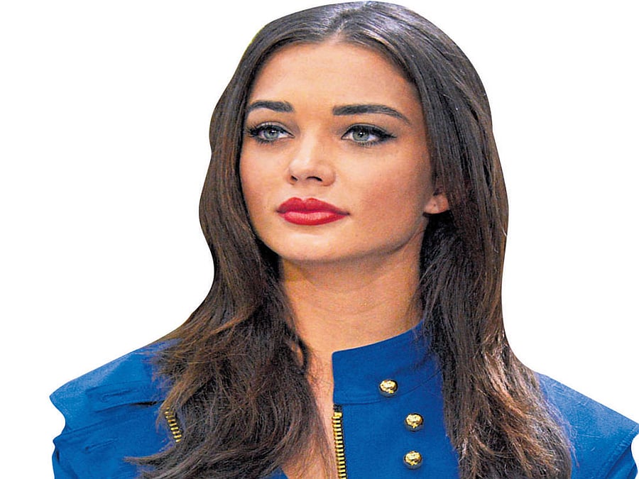 elated Amy Jackson