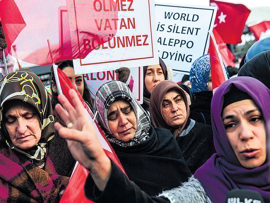 tears of solidarity: Women demonstrate in support of the citizens of Aleppo in Istanbul on Friday. Turkey, a Sunni regional power, is reshaping the Syrian battlefield by edging closer to Russia and dampening its longtime support for rebels fighting Assad. AFP