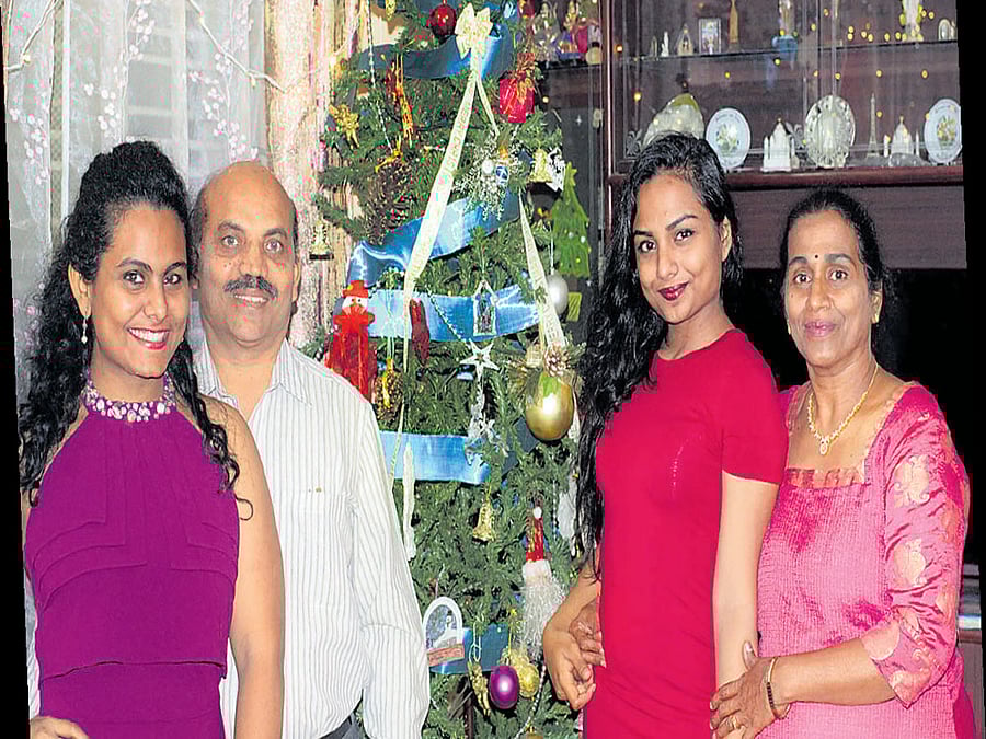 AT HOME Meryl, Martin, Mishel and Maria Menezes.