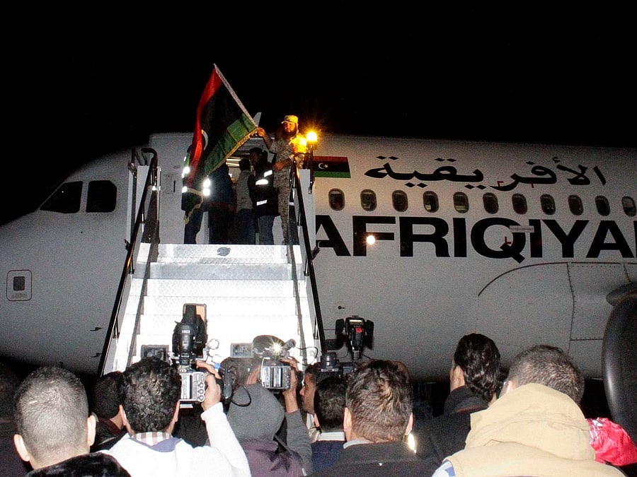 Passengers from plane that was hijacked and diverted to Malta return to Tripoli's Mitiga International Airport, Libya, December 24, 2016. REUTERS photo