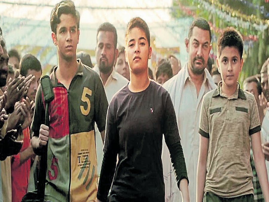 The film, helmed by Nitesh Tiwari, is based on the life of Haryana-based wrestler Mahavir Poghat, who trained his daughters, Geeta and Babita. Movie poster
