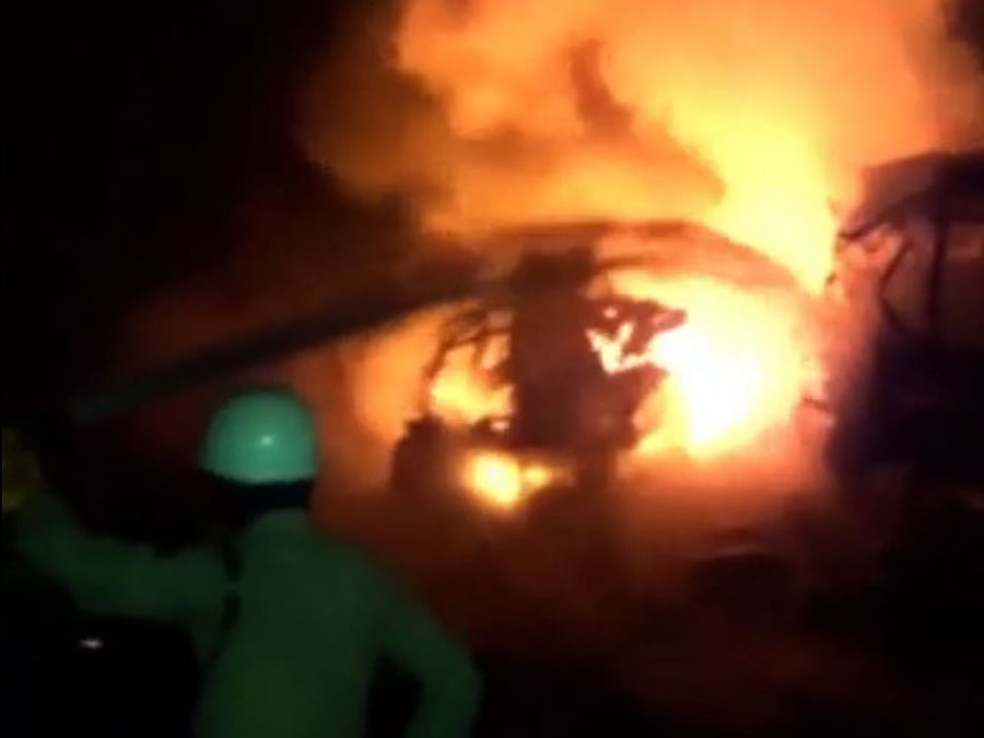 Deafening sounds of blasts and huge inferno were seen for quite some time as the cylinders, kept in the vehicles near a gas agency godown, exploded one after the other damaging at least one more car. Screengrab