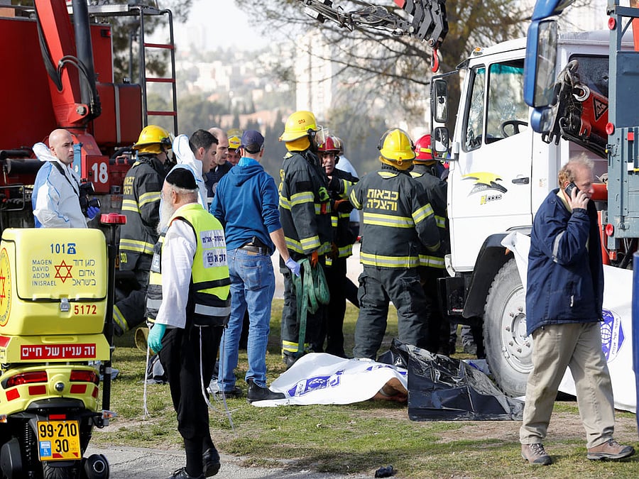 Israeli rescue forces work at the scene of a truck ramming incident in Jerusalem. Reuters photo