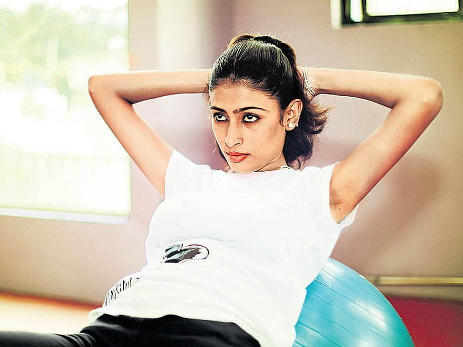 encouraging Fitness enthusiasts are posting pictures of them working out on social media in an attempt to motivate others.