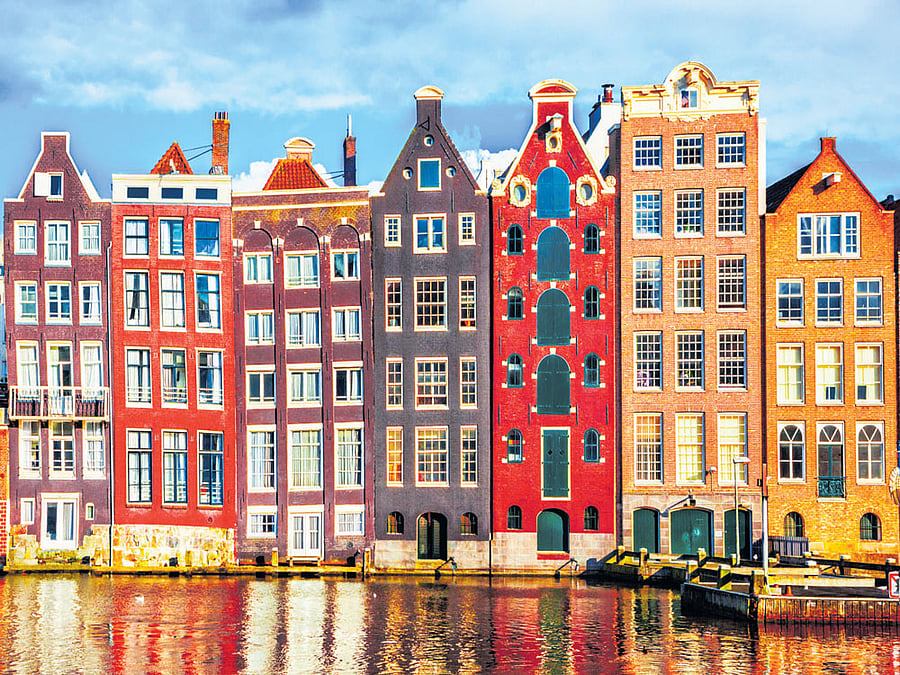 skewed buildings The dancing houses, another waterfront attraction in Amsterdam.