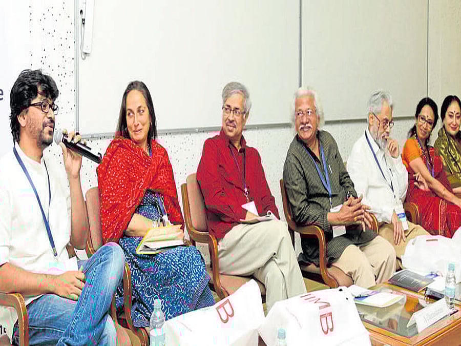 Filmmaker Pawan Kumar (left) speaks at the discussion on 'Creative Sustainability: As Artistes See it' organised by Indian Institute of Management Bengaluru on Sunday. Directors Adoor Gopalakrishnan, Vipin Vijay, artiste Sanjna Kapoor and others are also seen. DH PHOTO