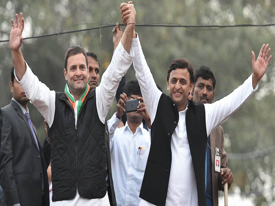 Uttar Pradesh Chief Minister and Samajwadi Party President Akhilesh Yadav and Congress Vice President Rahul Gandhi during their road show in Lucknow on Sunday. PTI Photo