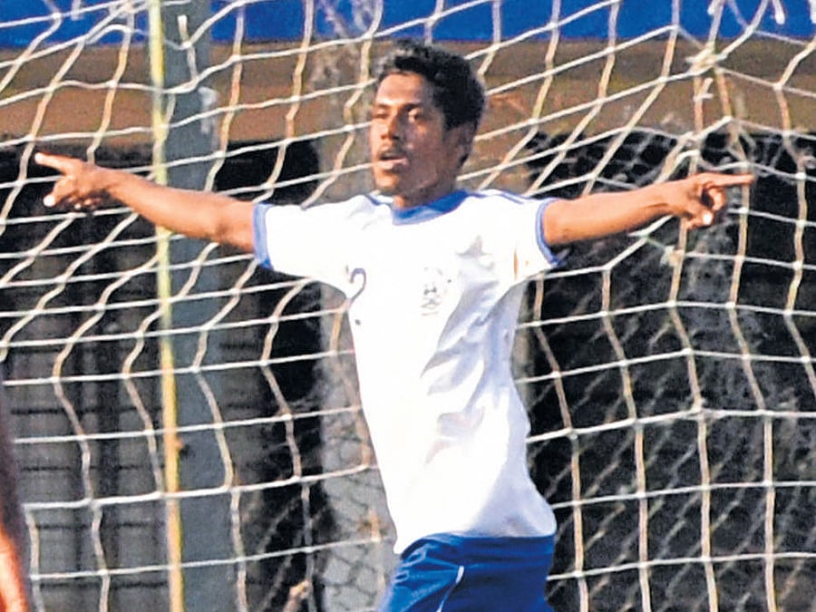 fine show Nanda of Students Union celebrates after scoring against RWF in the Super Division on Monday. DH photo
