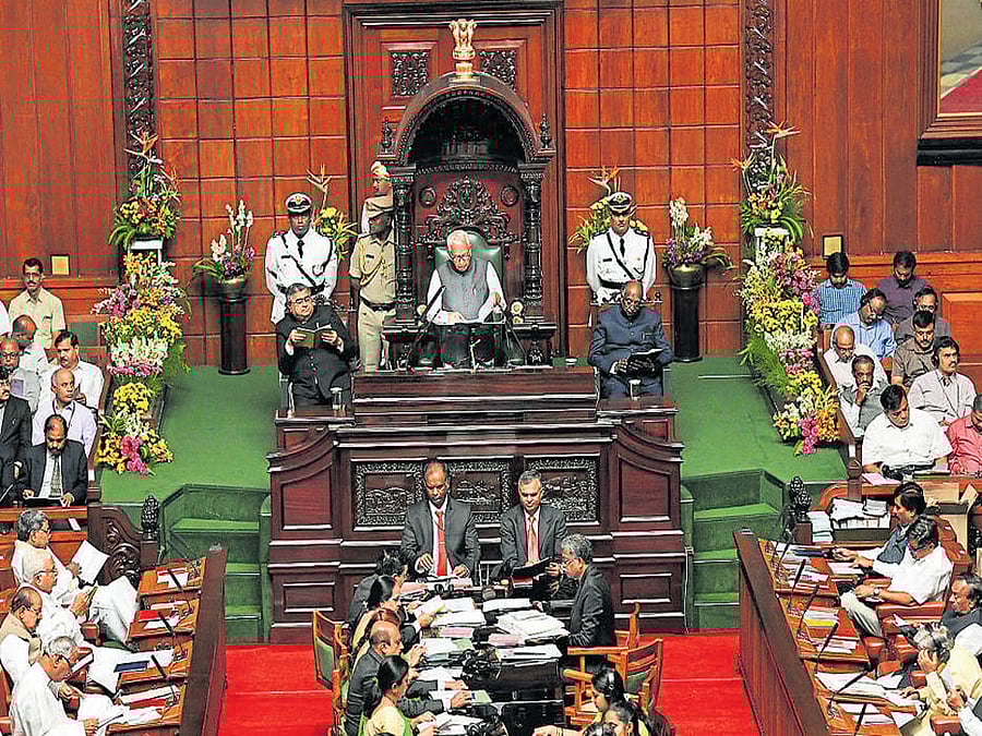 Governor Vajubhai Vala addresses the joint session of the legislature at the Vidhana Soudha in Bengaluru on Monday. dh photo