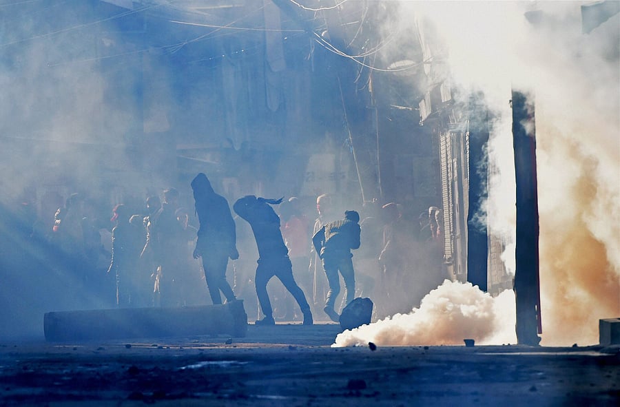 Security forces fired tear smoke shells and several live rounds to disperse the protesters but in vain, the official said. He said 19 people were injured in the security forces' action. One of the four who suffered bullet injuries succumbed. The deceased has been identified as Mushtaq Ahmad Itoo. While 15 injured people have been shifted to Anantnag district hospital, three others have been referred to a hospital here, the official said. He said clashes were going on in the affected areas of Kulgam district till reports last came in. PTI photo