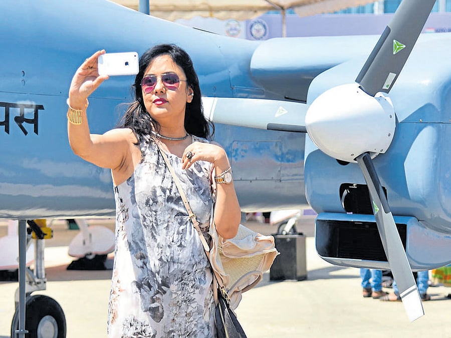 fun time Mimi Chatterjee, a spectator takes a selfie at 'Aero India 2017'. DH PHOTOS BY B K JANARDHAN