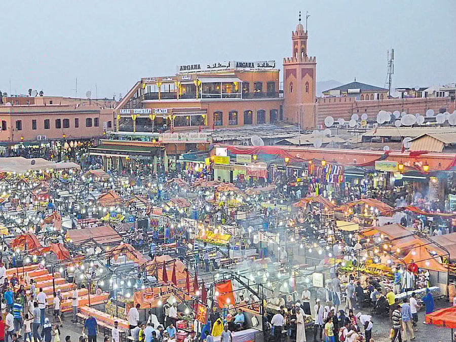 come, take part Jemaa el-Fna, the ever-buzzing public square in Marrakech.